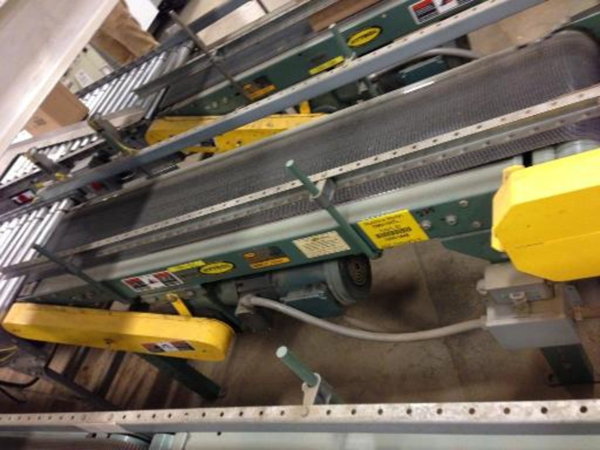 Hytrol belt conveyor16 inch x 5 feet long. Located in Marion, Ohio Rigging Fee: $200