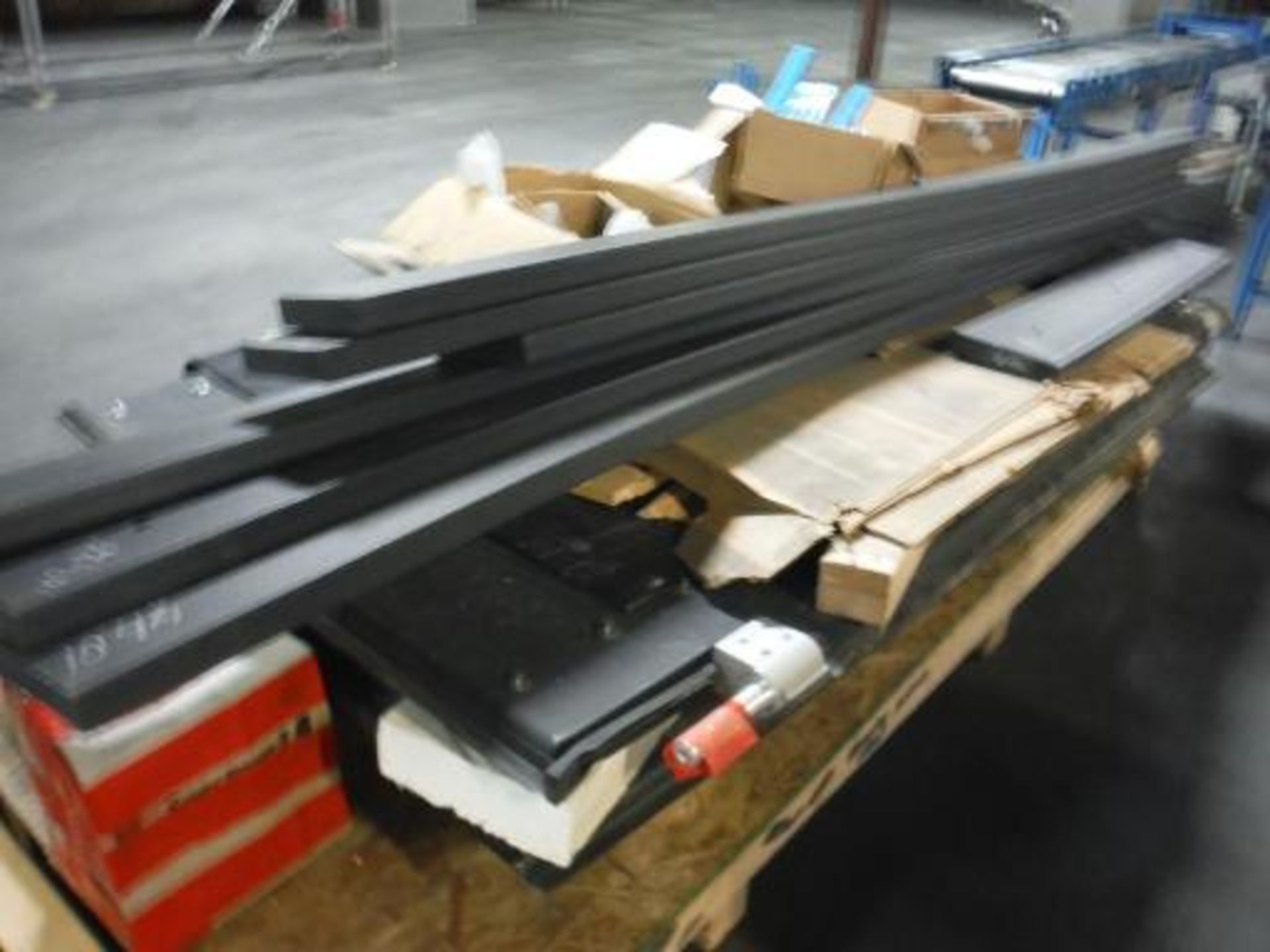 Lot of (2) bump doors 48 in. wide x 92 in. tall, approx 60 feet of 2x8 in. poly board This item is - Image 2 of 2