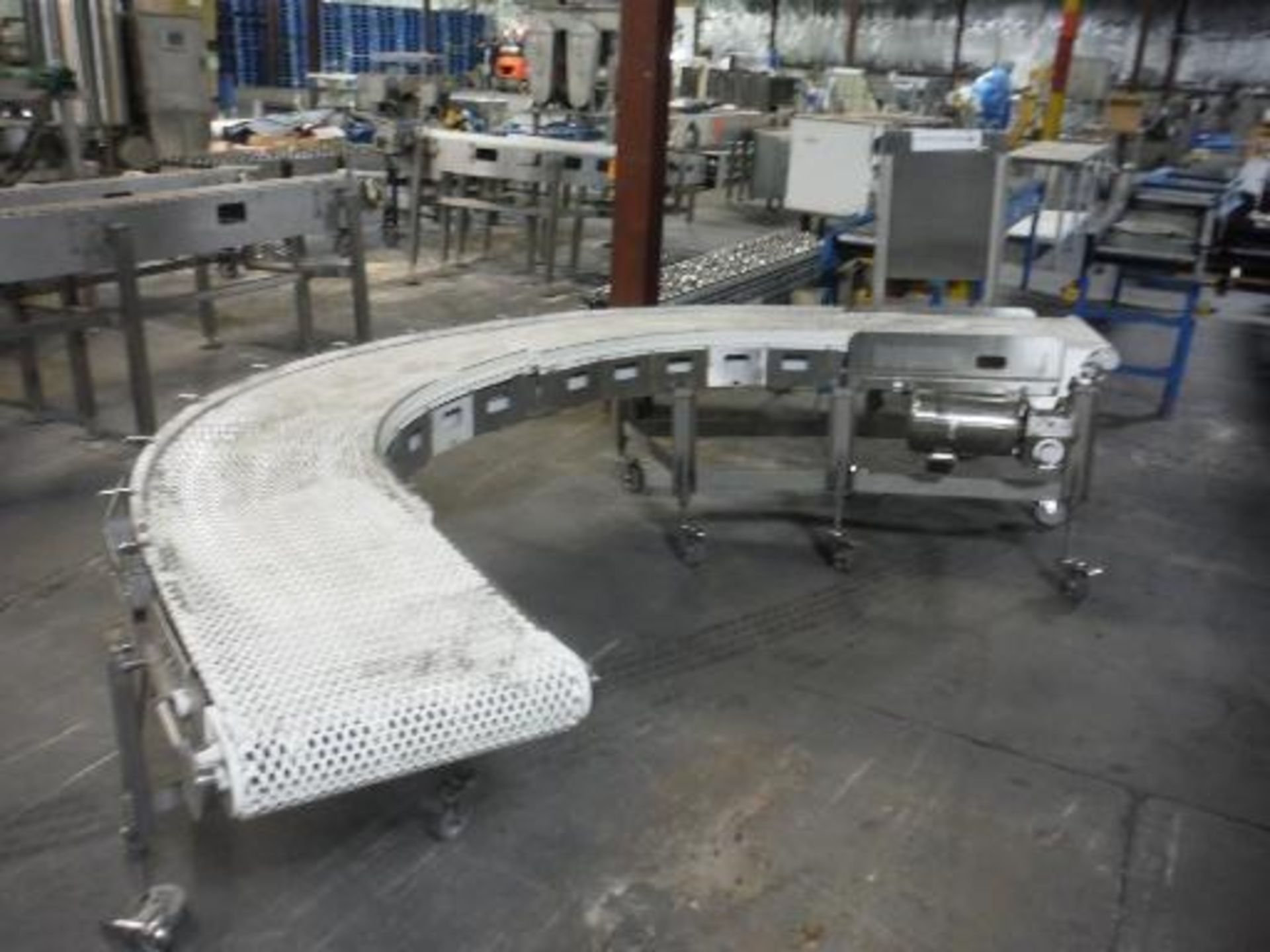 135 degree conveyor, plastic interlock belt 17.5 in. wide, overall dim 120 in. long x 72 in. wide