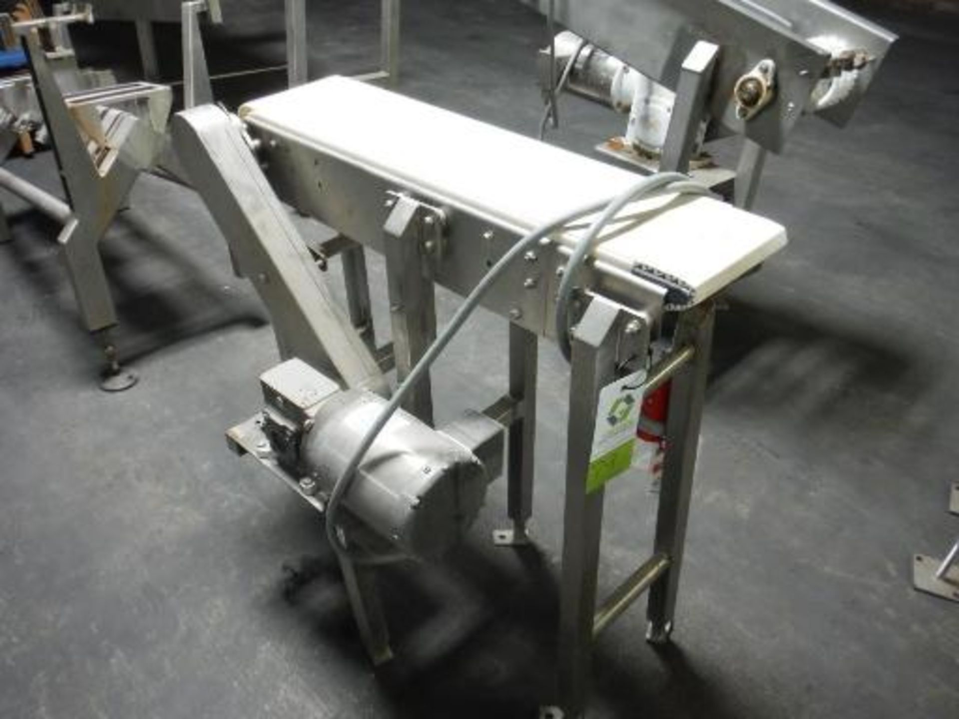 Powered conveyor, plastic interlock belt, 38 in. long x 8 in. wide x 36 in. tall, SS frame, 0.5 hp