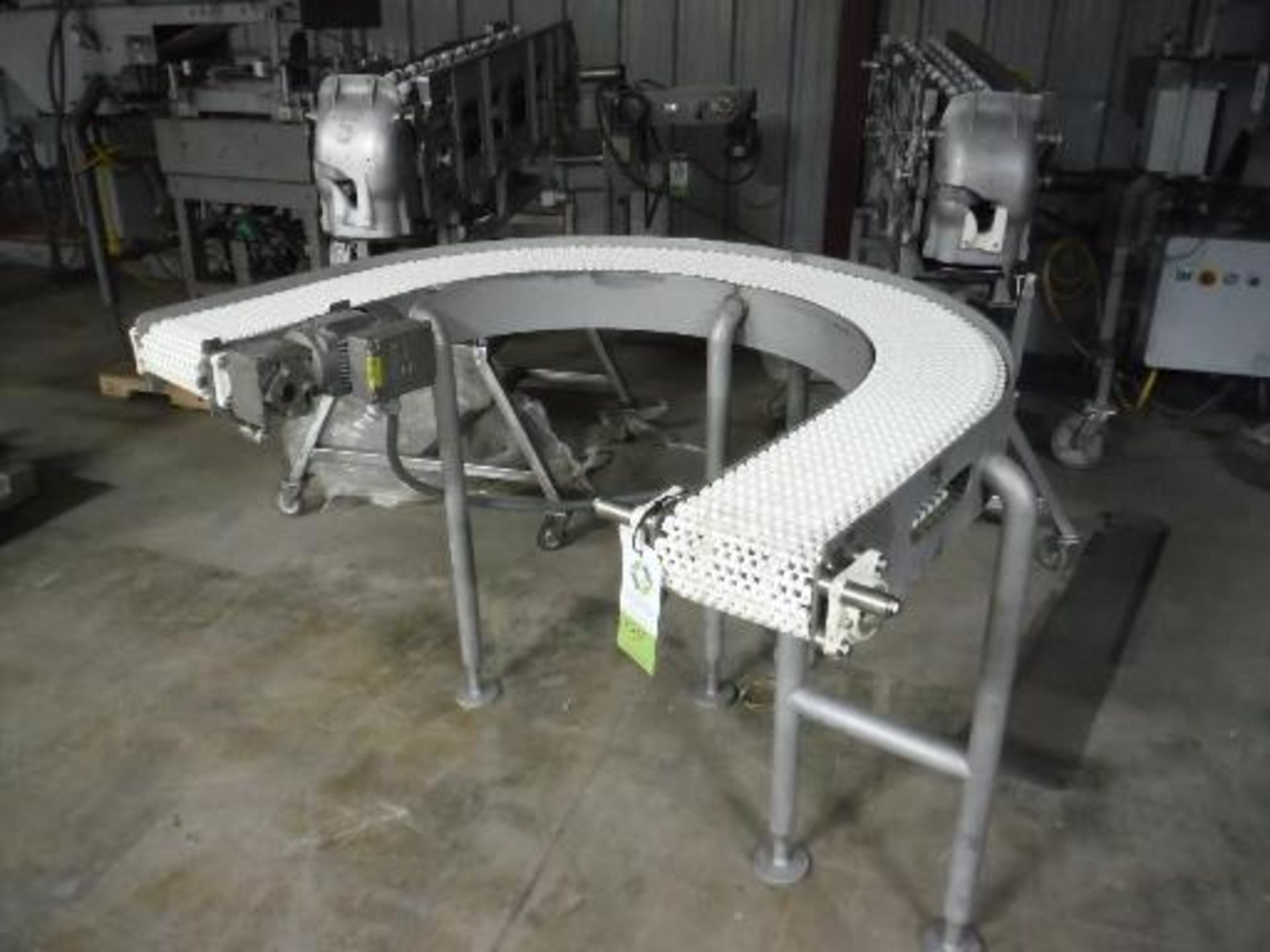 U-Shaped SS conveyor 8 in. wide, Sew motor and drive 3 hp, 3 Ph 230/460 V, overall dimensions 56 in.