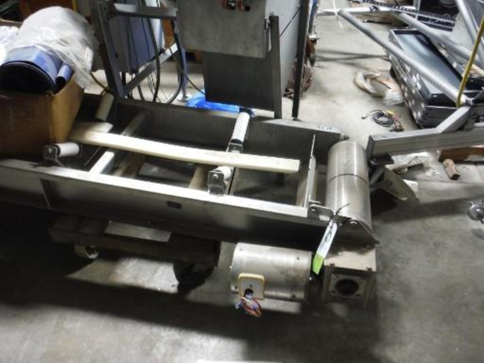 SS hanging overhead v-conveyor, 23 ft. long x 18 in., 1 hp SS washdown motor, missing legs This item