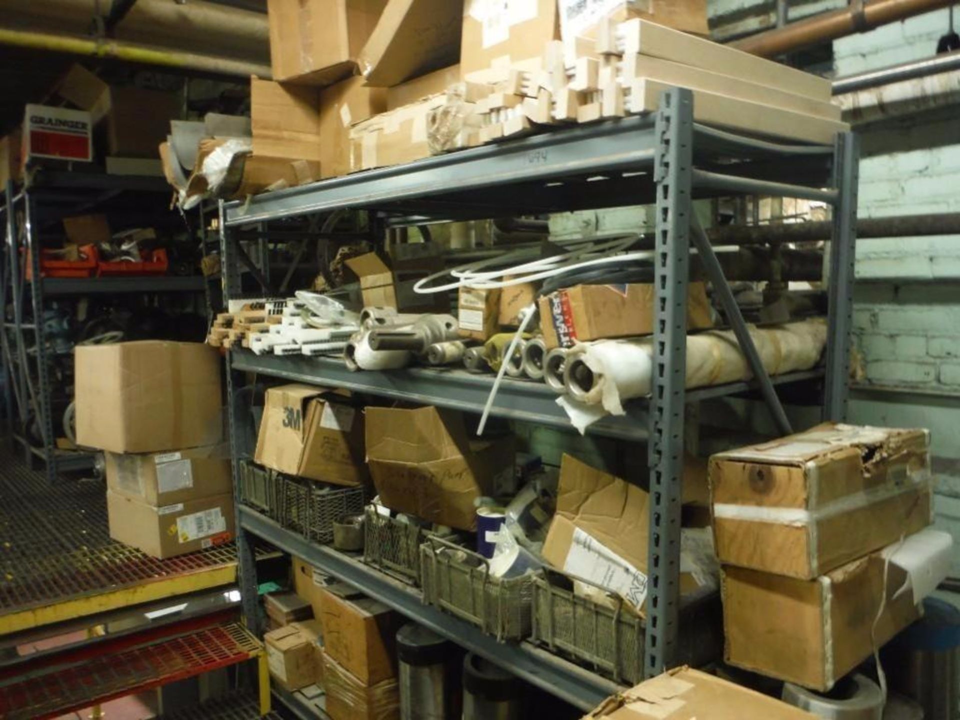10 Shelves & content: Miscellaneous valves, fittings, brushes, and parts  Rigging Fee: $1000