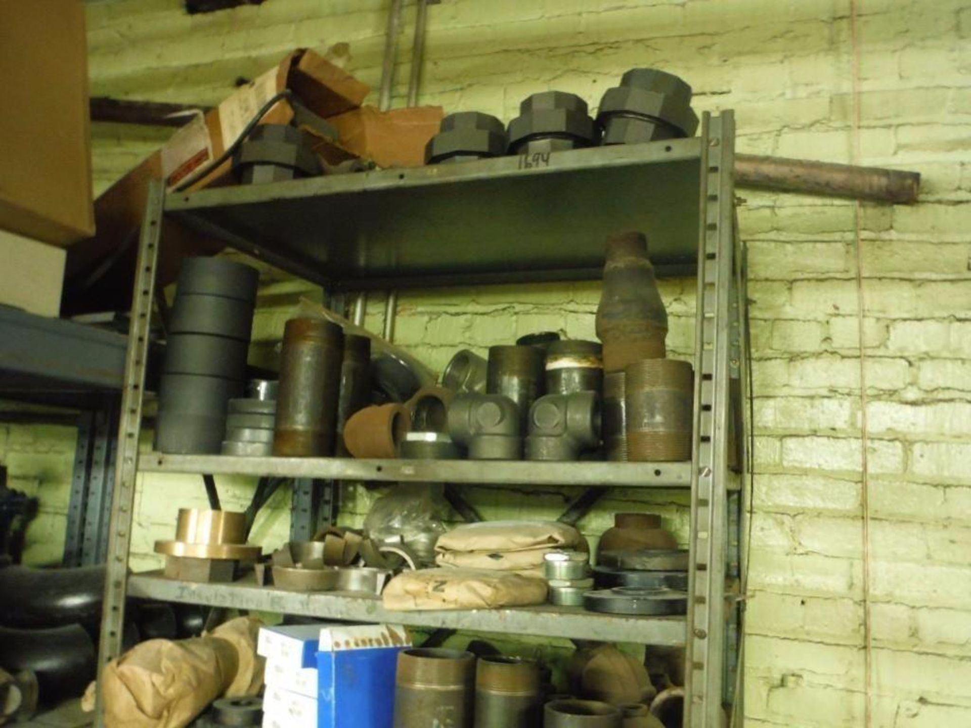 10 Shelves & content: Miscellaneous valves, fittings, brushes, and parts  Rigging Fee: $1000 - Image 6 of 14