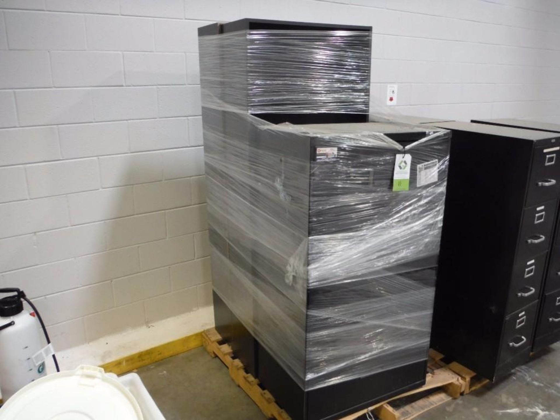 (1) lateral filing cabinet and (2) book cases / Rigging Fee: $50