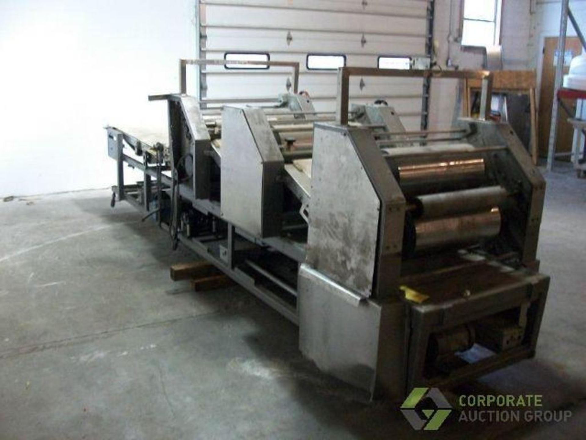 Moline Sheeting Line, includes makeup conveyor and 3 sheeting heads. Sheeting head dimensions: #1 -