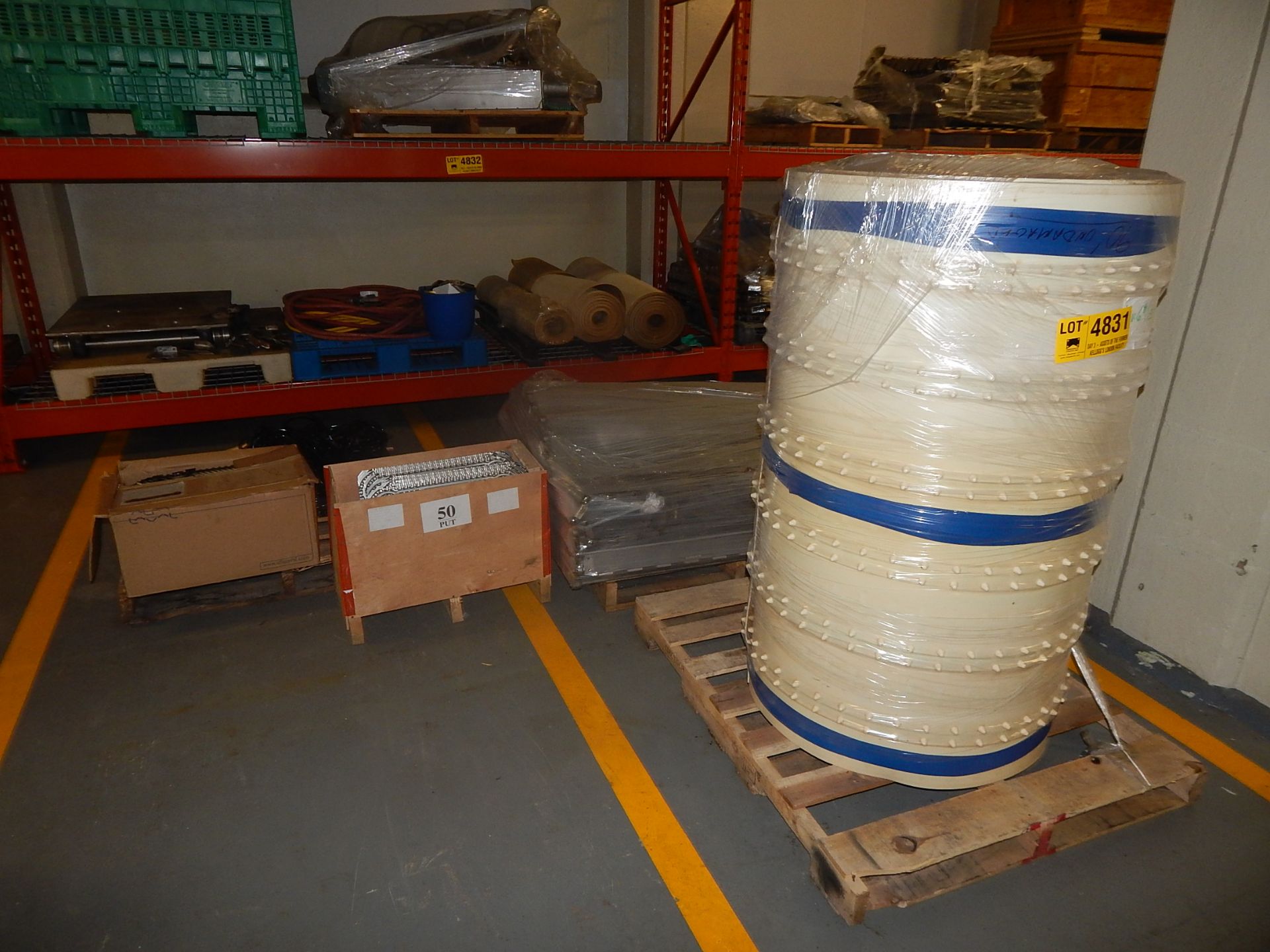 LOT/ CONTENTS OF SKIDS CONSISTING OF RIBBED BELT, STAINLESS STEEL BELT AND HEAT EXCHANGER PLATES (