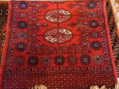 Red wool Persian-style rug, medallions t