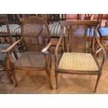 Stained wood caned open armchair having