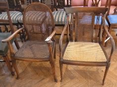 Stained wood caned open armchair having
