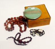 Various bead necklaces, a Rowenta powder