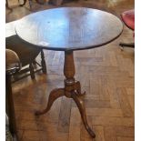A small 19th century oak snap-top table,