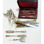 Part set of foreign silver dessert knive