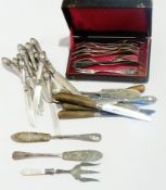 Part set of foreign silver dessert knive