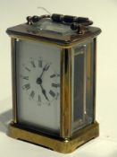 Brass carriage timepiece in plain case,