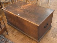 An oak rectangular coffer on plinth with