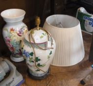 A large Chinese ceramic lamp base on woo