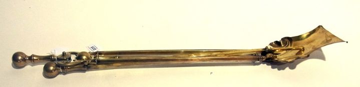 Set of three brass fireside implements,