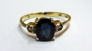 14K gold and blue stone ring, set oval f