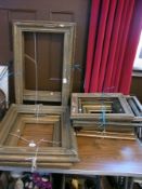 A large assortment of picture frames in