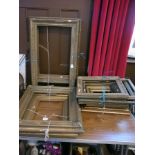 A large assortment of picture frames in