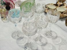 A set of six cut glass stem wine glasses