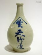 Oriental porcelain bottle painted in blu