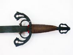 Ornate iron sword, decorative handle, me