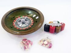 Bakelite roulette wheel with chips and b