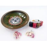 Bakelite roulette wheel with chips and b