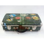 Vintage metal suitcase with BEA Hotel an