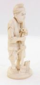Japanese ivory okimono figure of woodcut