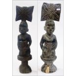 Two large carved African female figures,