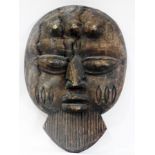 African carved wooden mask, probably Nig