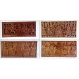 Set of three Nigerian carved hardwood pa