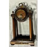 Empire style satinwood mantle timepiece,