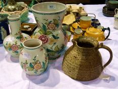 Three Portuguese pottery vases, floral d