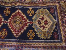 Persian style wool rug decorated with cr