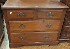 Walnut chest of two short and two long d