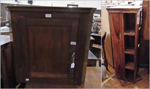 Stained wood wall-hanging corner cabinet