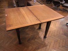 Oak dining table with fold-over hinged t