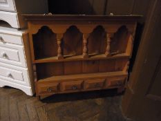 Stained pine wall-hanging shelf rack wit