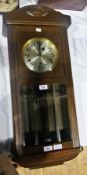 Early 20th century oak cased wall clock