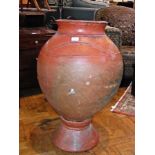 Large terracotta vase on stand, shoulder