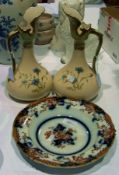 A pair of Chelsea Royal pottery ewers wi