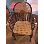 Caned back child's chair with caned seat