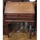 Stained wood bureau with fitted interior