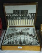 A boxed canteen of bone-handled knives,