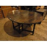 Antique oak gate-leg dining table, oval,