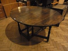 Antique oak gate-leg dining table, oval,